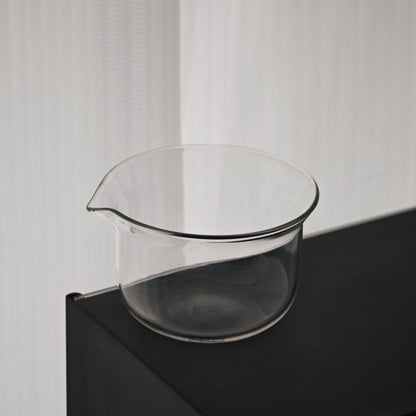 Clear glass pitcher from the travel tea set