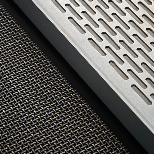 Close-up of the tea tray slots and woven mat texture