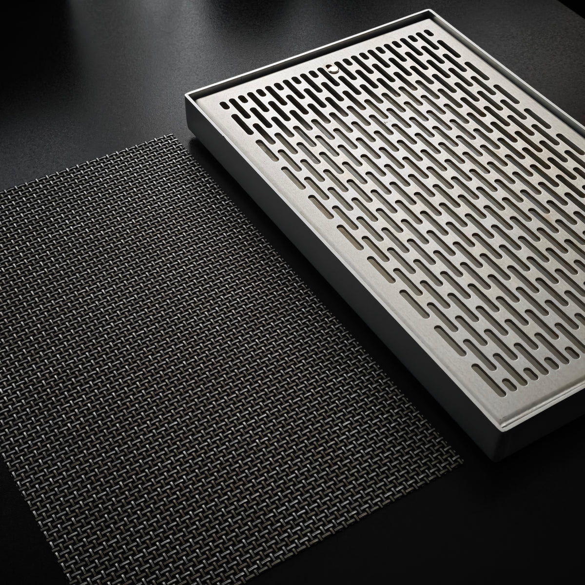 Angled view of the removable slotted tea tray top