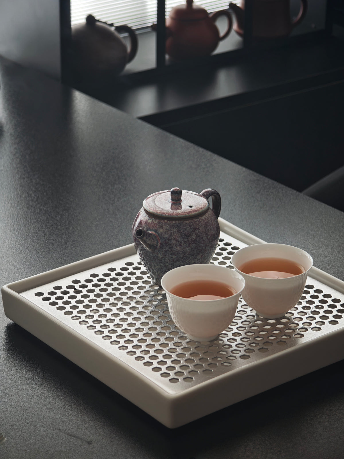 Two cups by the window, and a little time to slow down.