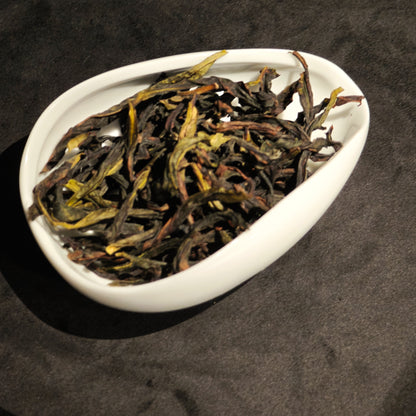 Close-up of opened Ya Shi Xiang tea leaves