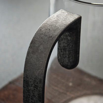 Close-up of the tea pitcher's handle