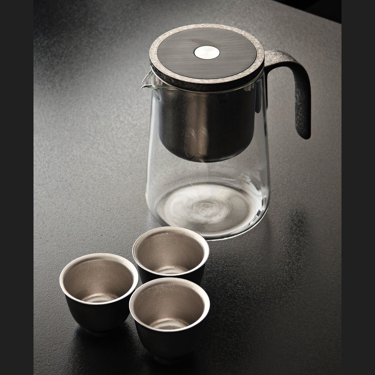 Glass pitcher, titanium brewing chamber, lid, and three cups