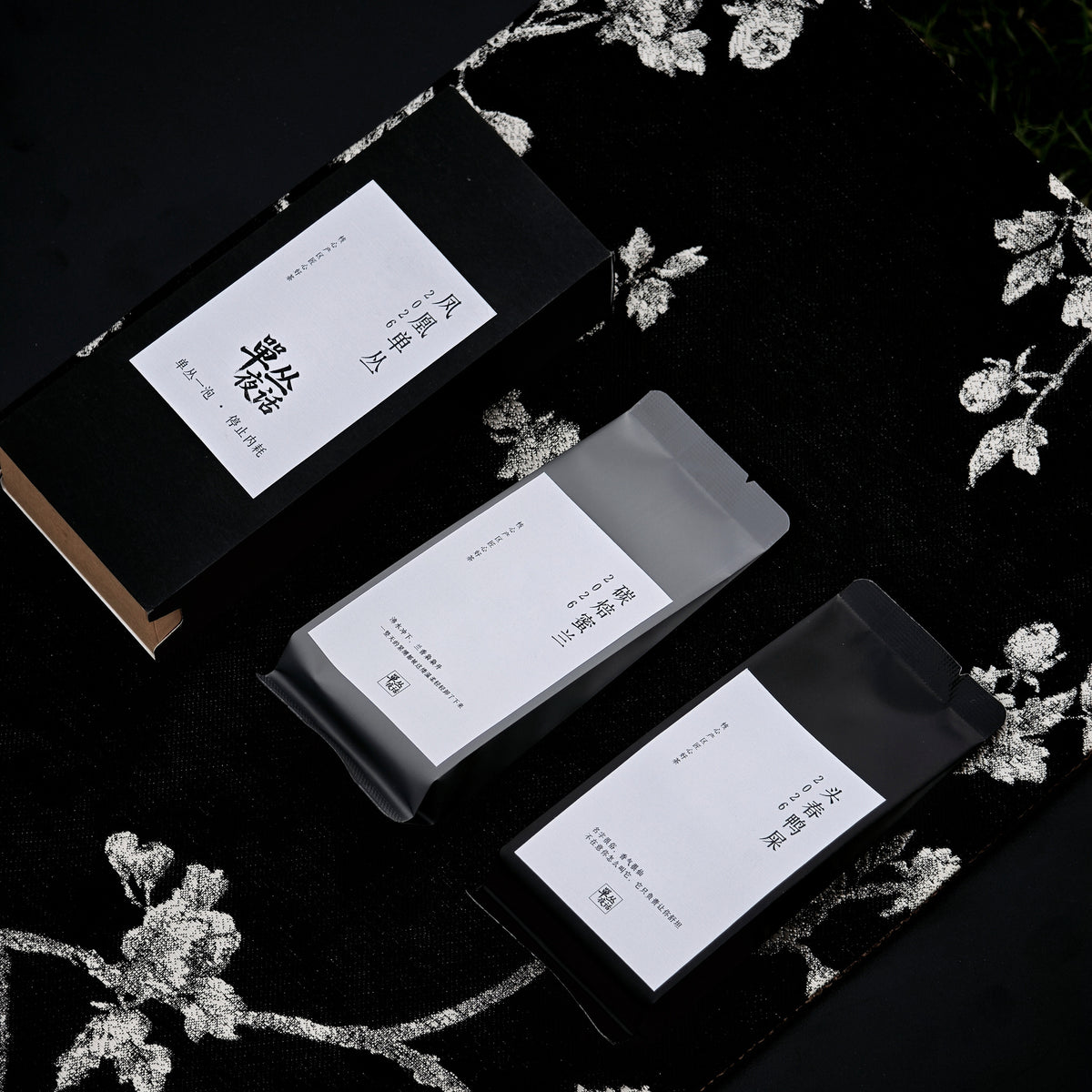 Two Phoenix Dancong sampler packages arranged together