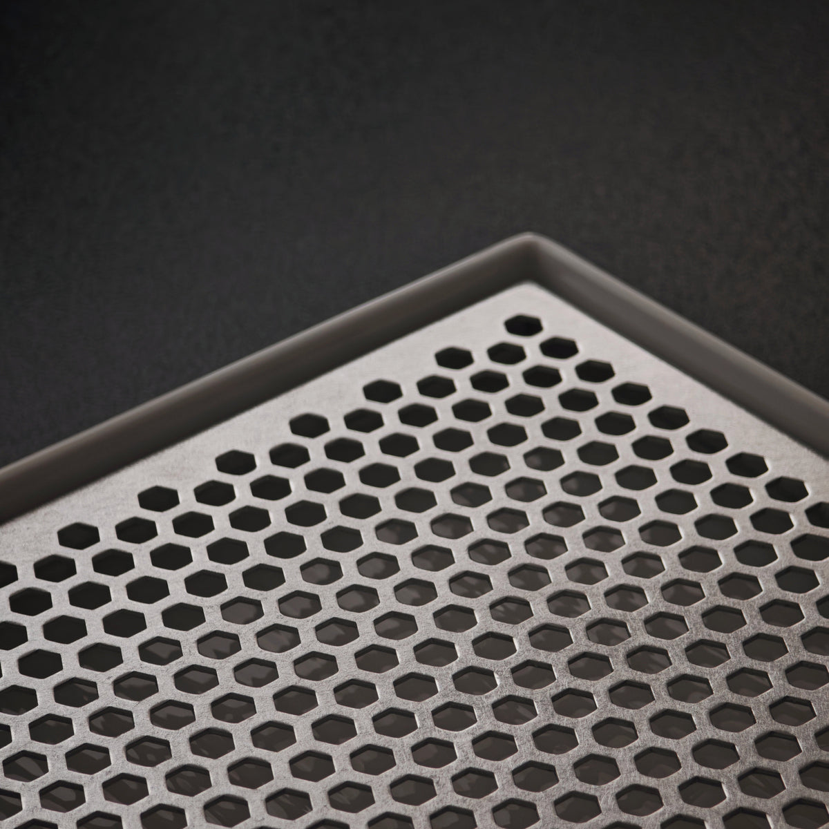 Detail of the hexagonal openings in the tray insert