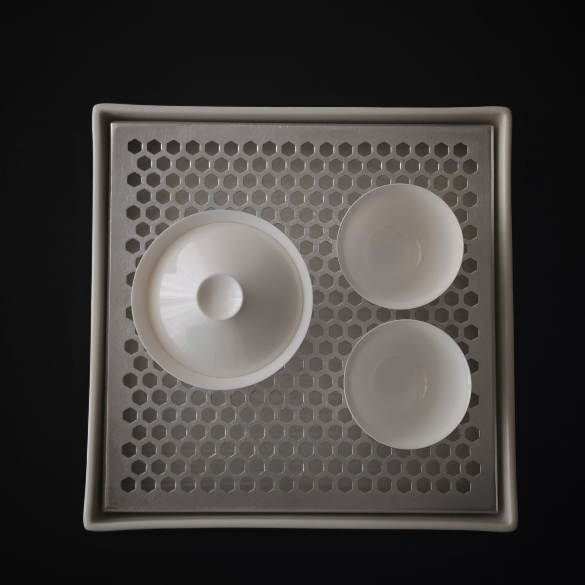 Overhead tea setting on the white porcelain tray
